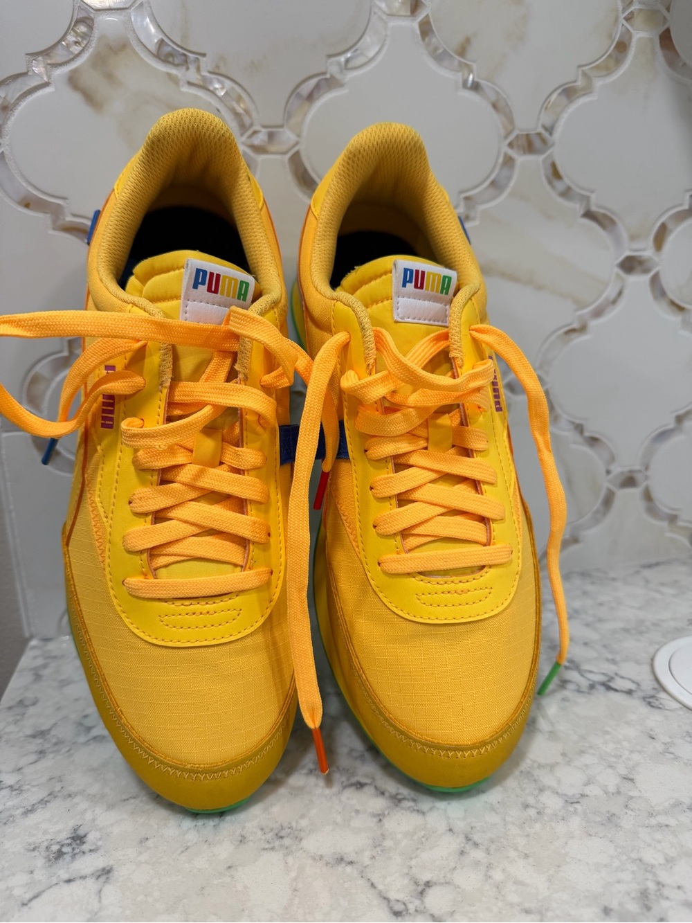 Puma Yellow Low-Top Athletic Sneakers with Rainbow Logo